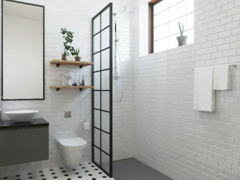 Pare-douche à carreaux noirs devant des murs de faïence blanche et un sol damier